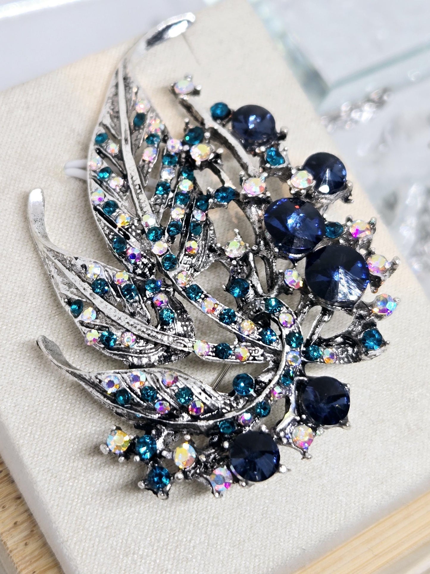 Silver Plated Brooch – Feather Design with Sparkling Sapphire Rhinestones Pin