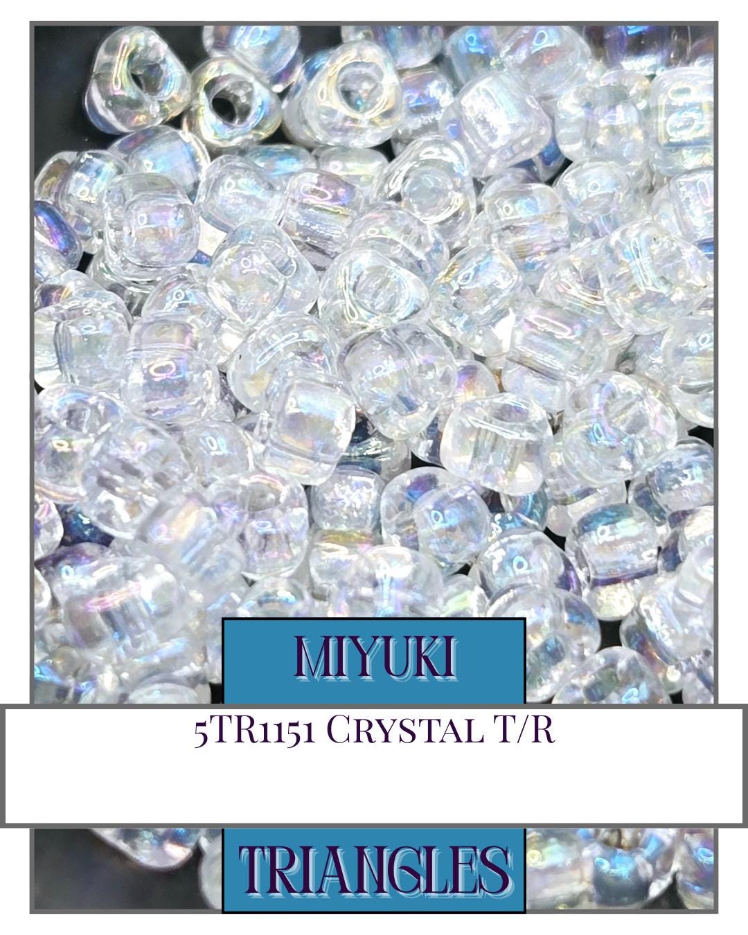 a pile of crystal beads with a blue border