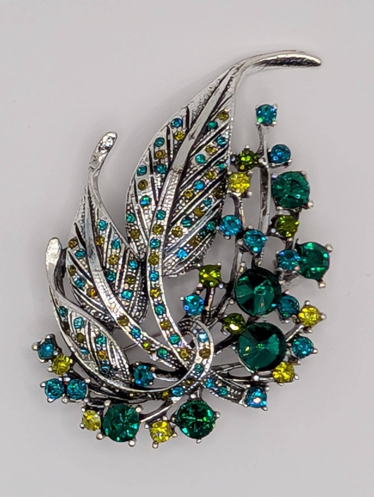 Silver Plated Brooch - Green Feather Decorative Pin With Blue Topaz & Emerald Accents