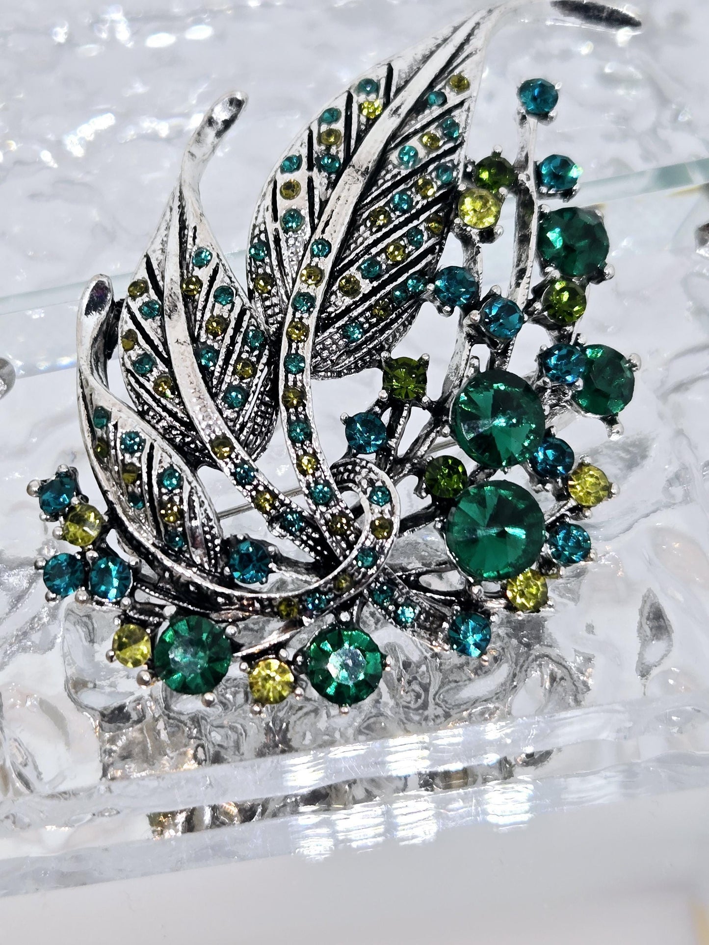 Silver Plated Brooch - Green Feather Decorative Pin With Blue Topaz & Emerald Accents