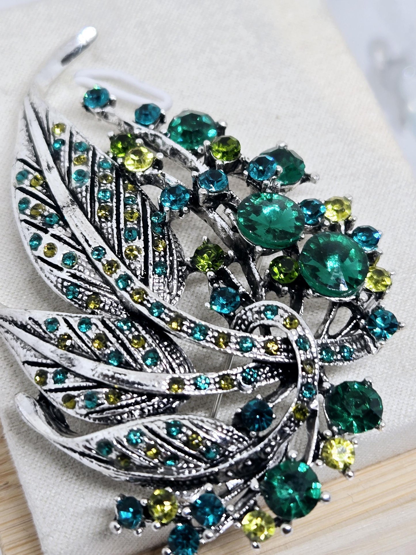 Silver Plated Brooch - Green Feather Decorative Pin With Blue Topaz & Emerald Accents