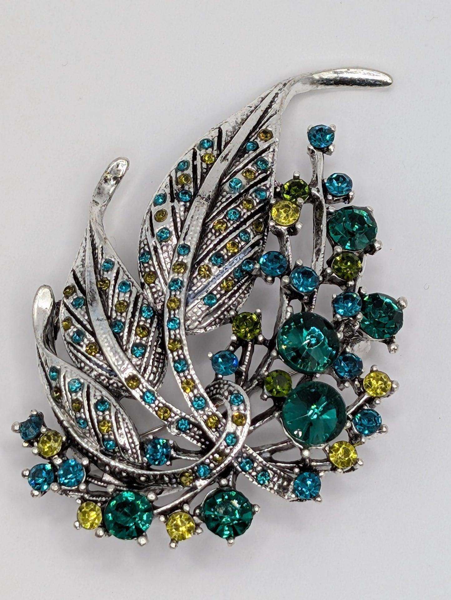Silver Plated Brooch - Green Feather Decorative Pin With Blue Topaz & Emerald Accents