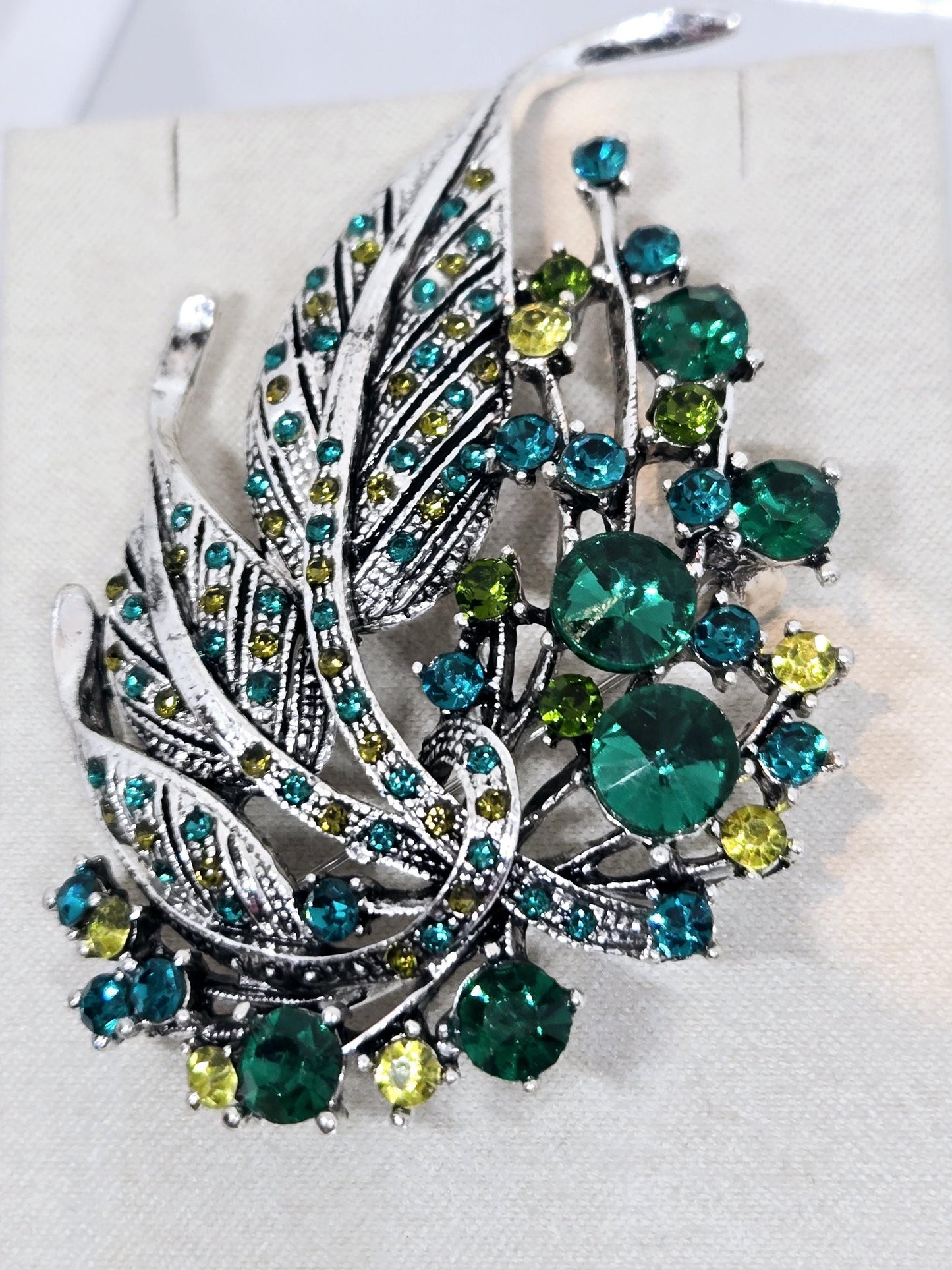 Silver Plated Brooch - Green Feather Decorative Pin With Blue Topaz & Emerald Accents