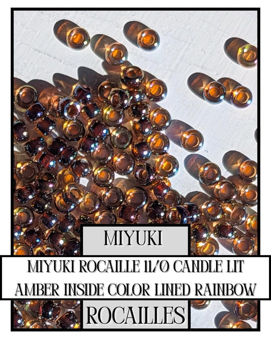 11-0357 Miyuki Rocailles 11/0 | Candle Lit/Amber Inside Color Lined/R 20g